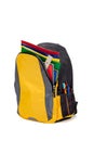 Yellow backpack with school supplies Royalty Free Stock Photo