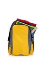 Yellow backpack with school supplies Royalty Free Stock Photo