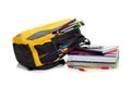 Yellow backpack with school supplies Royalty Free Stock Photo