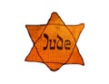 Yellow badge or Jewish badge - Jewish star yellow colors. Image for Holocaust Memorial Day Royalty Free Stock Photo