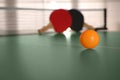 Yellow ball on ping pong table, space for text Royalty Free Stock Photo