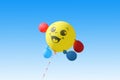 Yellow balloon flying on a blue sky background Royalty Free Stock Photo