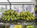 Yellow banana on the back of clear glass cabinet Royalty Free Stock Photo