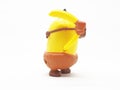 Yellow Banana Minion Toys Plastic Model from Despicable Me Movie in White Isolated Background Royalty Free Stock Photo