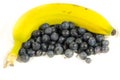 Yellow banana with some fresh sweet blueberry`s Royalty Free Stock Photo