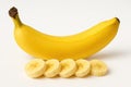 yellow bananas and sliced fruit. The background is white, which emphasizes the freshness and brightness of the fruits Royalty Free Stock Photo