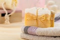 Yellow bar of natural organic handmade soap on towel Royalty Free Stock Photo