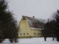 Former Gilead School yellow gambrel barn in Lansing NY Royalty Free Stock Photo