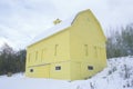 Yellow barn in snow, MI