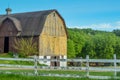 Yellow Barn With White Fence