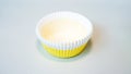 Yellow basket for muffin and cupcake. On a white background, a colored basket for a pie Royalty Free Stock Photo