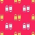 Yellow Battery icon isolated seamless pattern on red background. Lightning bolt symbol. Vector