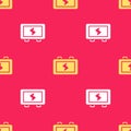 Yellow Battery icon isolated seamless pattern on red background. Lightning bolt symbol. Vector