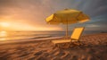 Yellow beach chair and umbrella on the beach with beautiful sky during sunset, summertime, vacation, travel destination concept, Royalty Free Stock Photo