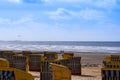 Yellow beach chairs on a sandy beach