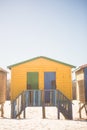 Yellow beach hut on sand Royalty Free Stock Photo