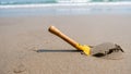 The yellow beach toy shovel is using to dig sand. Royalty Free Stock Photo