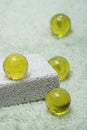 Yellow beads of bath oil