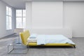 Yellow bed, concrete floor side Royalty Free Stock Photo