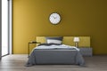 Yellow bedroom interior with clock Royalty Free Stock Photo