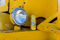 A yellow beer can on a yellow truck in the Nevada desert, USA