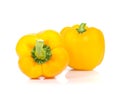 Yellow bell peppers cut pieces on white background. Royalty Free Stock Photo