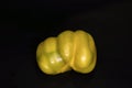 Yellow bellpepper or capsicum isolated on black background Royalty Free Stock Photo