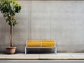 a yellow bench sitting next to a tree