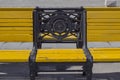 Yellow bench on a sunny day