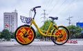 Yellow bicycle with Chinese decorative symbols, Wuhan