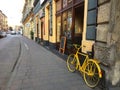 Yellow bicycle on the street in Krakow, Poland.