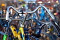 Yellow bike in bicycle park Royalty Free Stock Photo