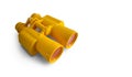 Yellow binoculars toy isolatedon white Royalty Free Stock Photo