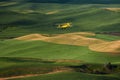 Yellow Biplane Crop Duster Flying Over Farmlands. Royalty Free Stock Photo