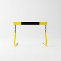 Yellow and black hurdle with black center bar standing on white background for athletic training Royalty Free Stock Photo