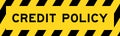 Yellow and black with line striped label banner with word credit policy