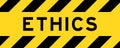 Yellow and black with line striped label banner with word ethics