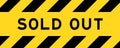 Yellow and black color with line stripe label banner with word sold out