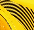 Yellow and black detail pattern on an old classic car.