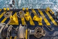 The deck of the ferry boat along with the a thick mooring rope and blue sea water wave, Thailand. Close up Royalty Free Stock Photo