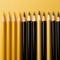 yellow and black pencils on a yellow background. Minimal style. Conceptual minimalist black art. Matte surface. Office supplies