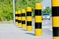 Yellow and black road safety posts