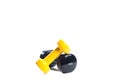 Yellow and black small dumbbells Royalty Free Stock Photo