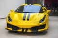 Yellow black spripes Luxury sports car Ferrari 488 Pista at showroom