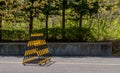 Yellow and black traffic barrier