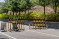 Yellow and black traffic barrier