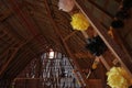 Yellow Black and White Tissue Pompom Decorations Dress up the Inside of a Rustic Barn for a Dance