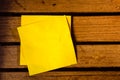 Yellow blank paper on wood pettern Royalty Free Stock Photo