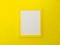 Yellow blank photo frame template on wall texture in gallery. 3d render illustration. Empty clean picture on yellow background for