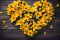 Yellow bloom heart wooden background, love and romance concept, copy space